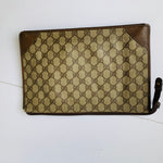 Authentic 1980’s Gucci Coated Canvas Clutch/Accessory Pouch in Brown