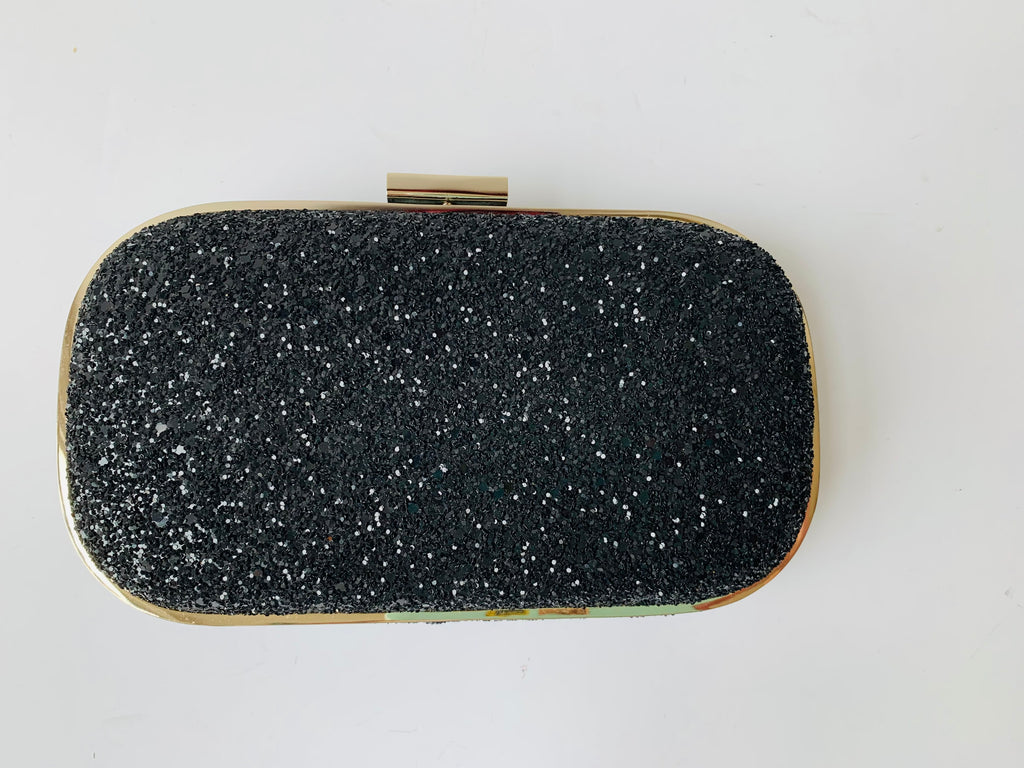 Anya hindmarch glitter discount clutch