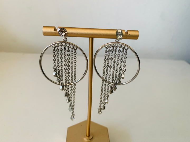 Circle Dangler Pierced Earrings in Silver Tone