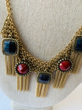 Gold Tone Tassel Necklace With Burgundy and Black Stones