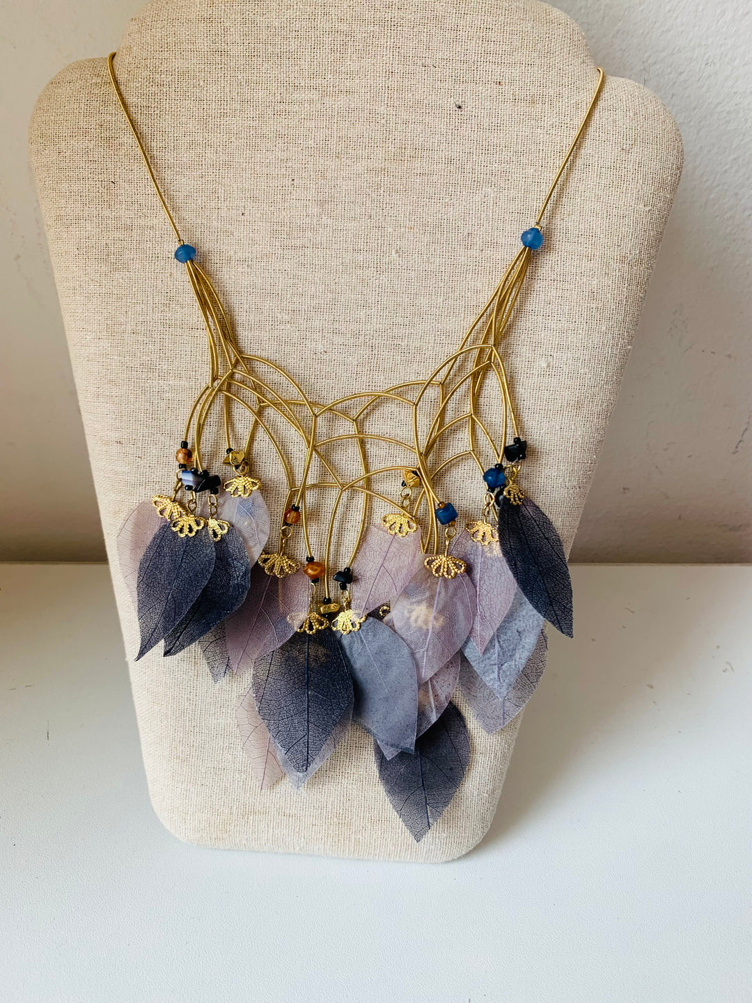 Blue Feather Statement Necklace in Gold Tone