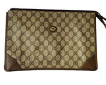 Authentic 1980’s Gucci Coated Canvas Clutch/Accessory Pouch in Brown