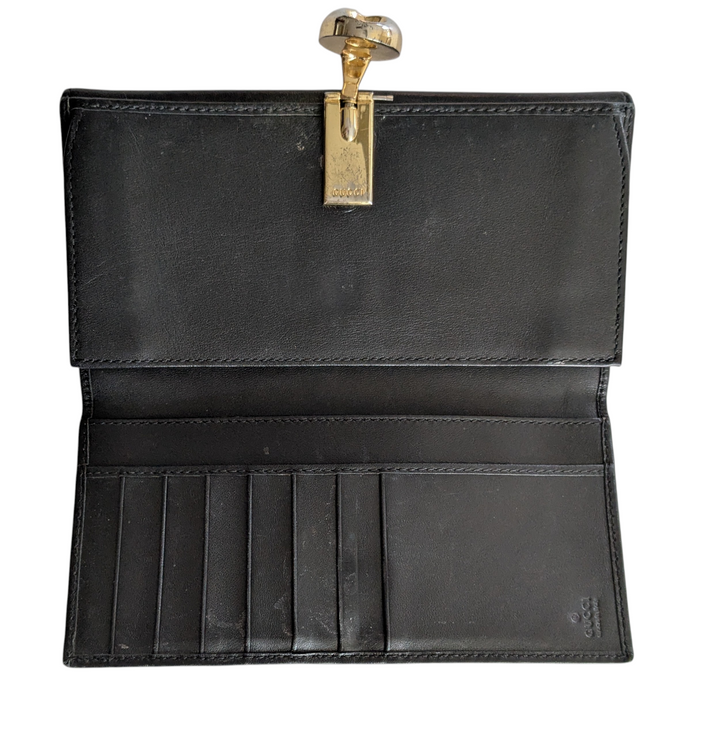 Gucci Logo Embossed Leather Wallet