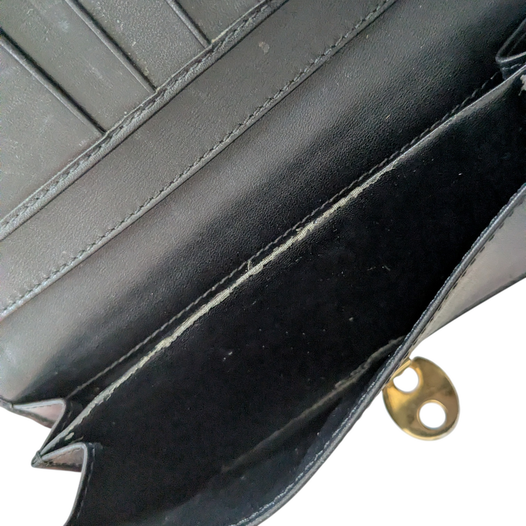 Gucci Logo Embossed Leather Wallet