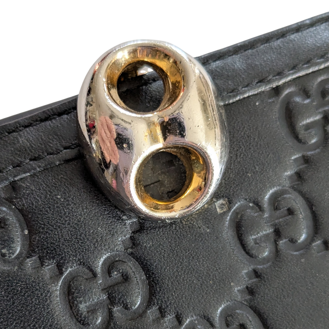 Gucci Logo Embossed Leather Wallet