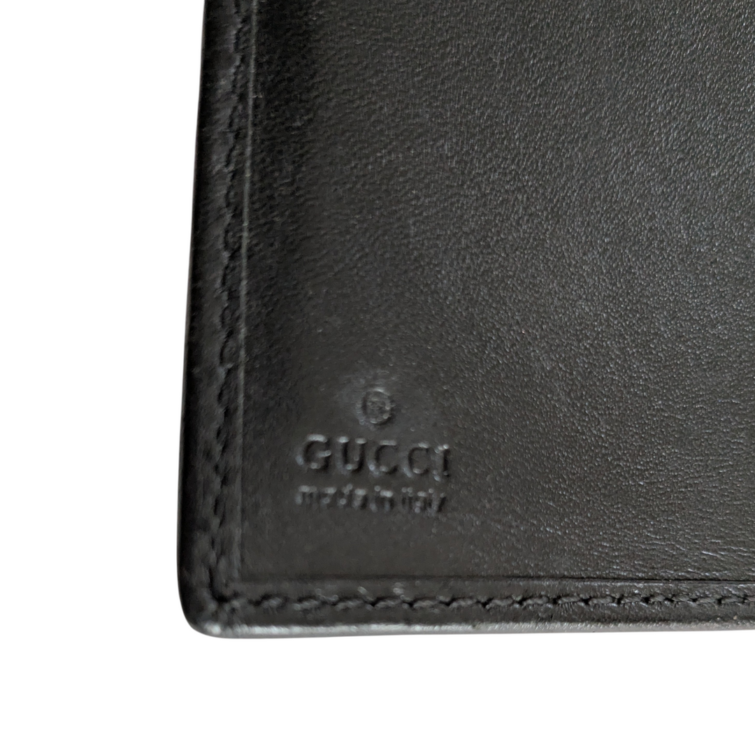 Gucci Logo Embossed Leather Wallet