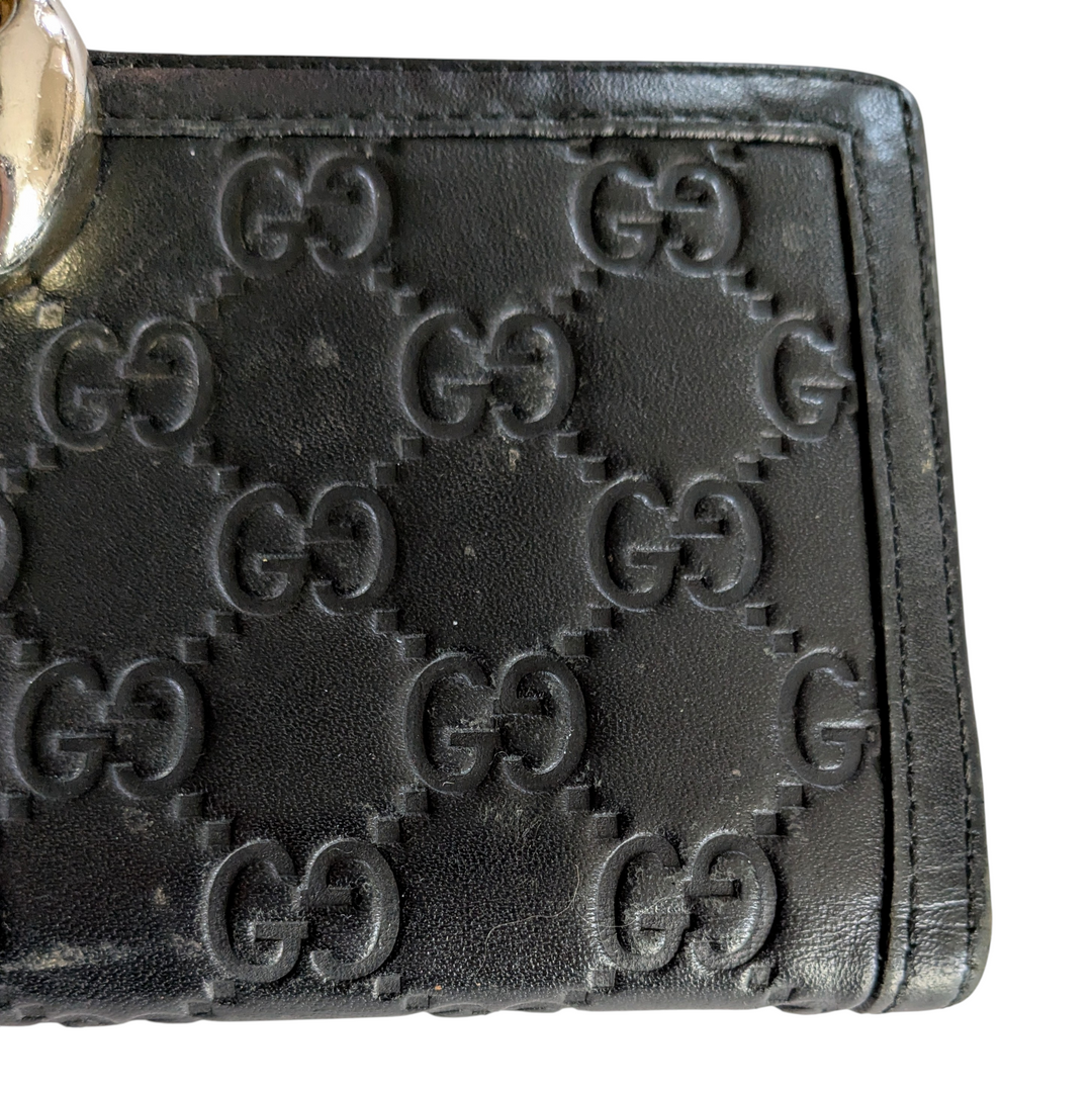Gucci Logo Embossed Leather Wallet