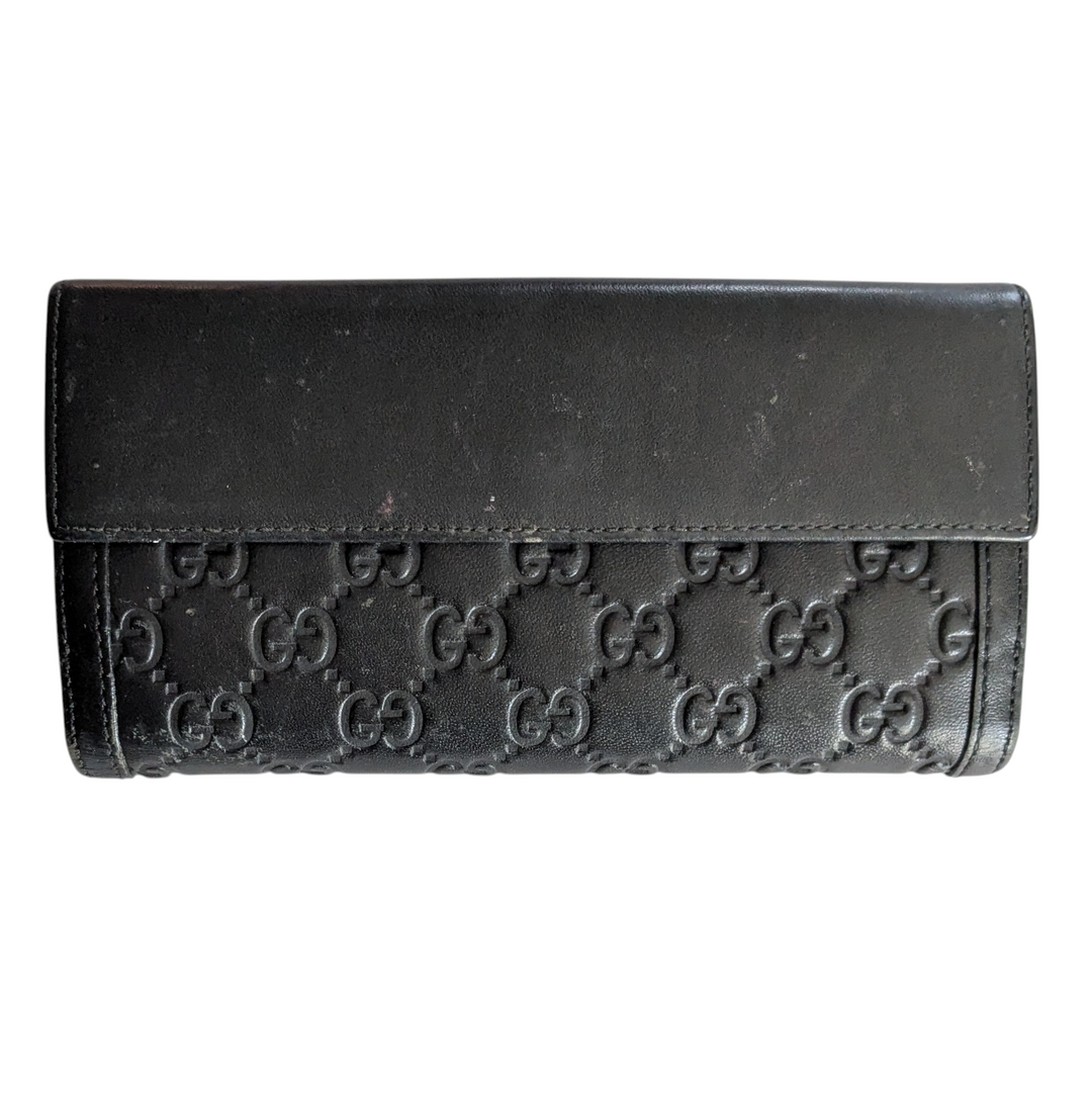 Gucci Logo Embossed Leather Wallet