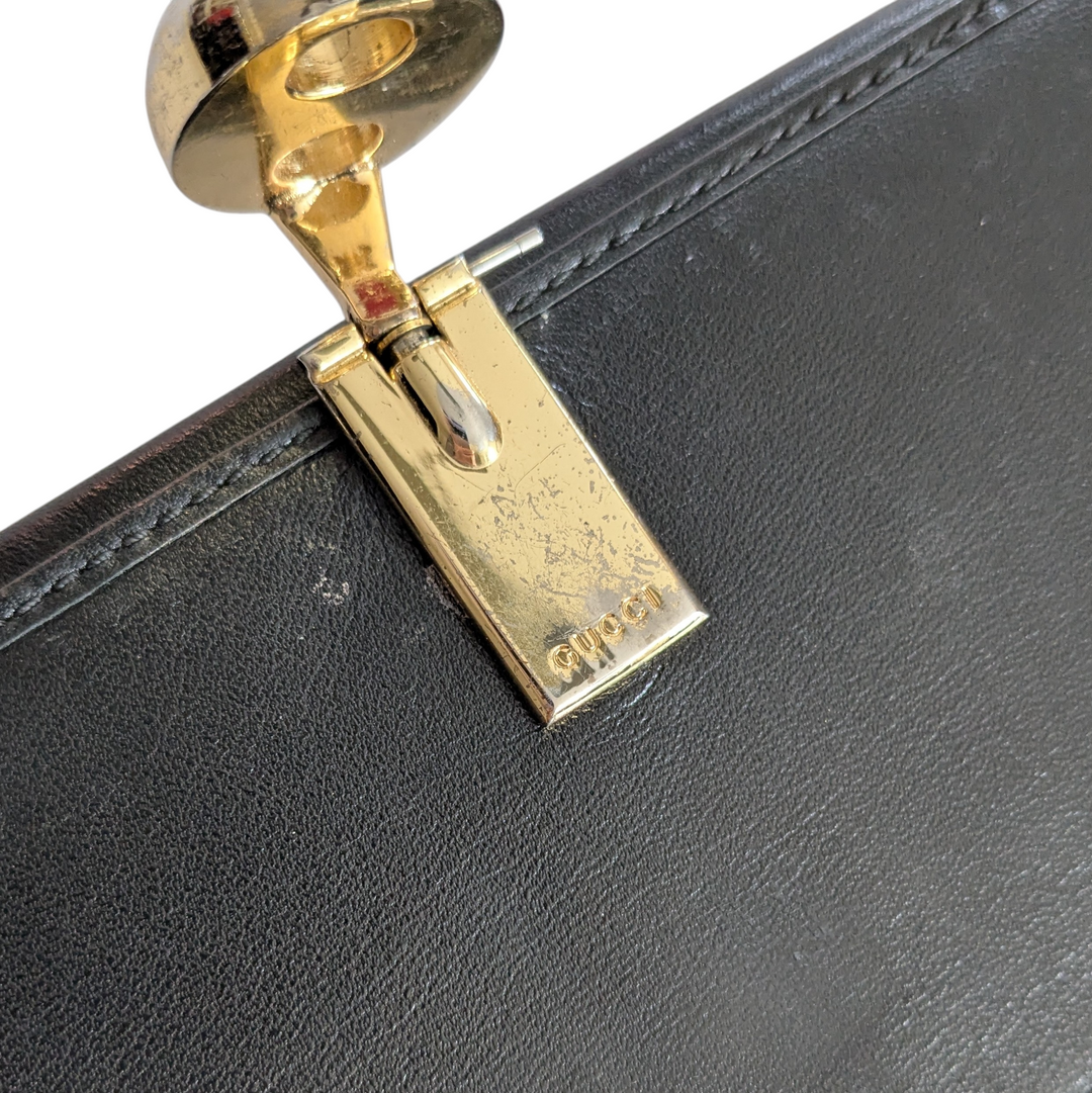 Gucci Logo Embossed Leather Wallet