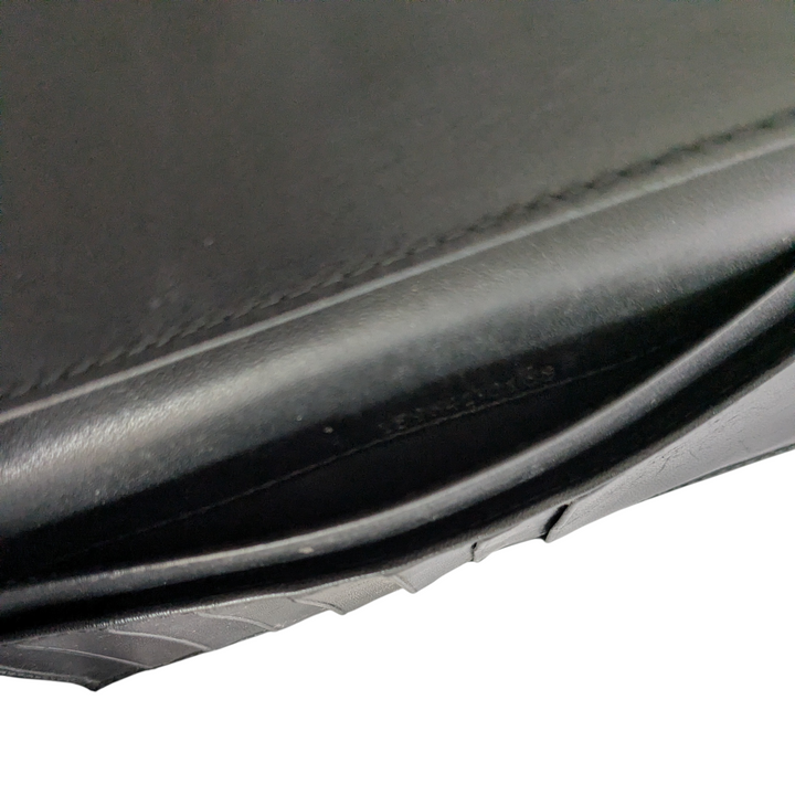 Gucci Logo Embossed Leather Wallet